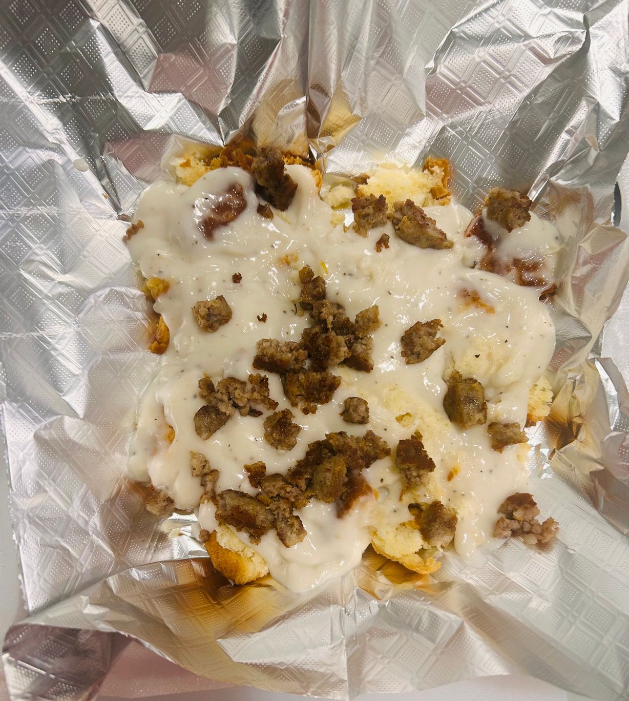 Biscuit sausage & gravy at JD SABOR REAL in Woodstock, GA 30188 | YourMenu® Online Ordering