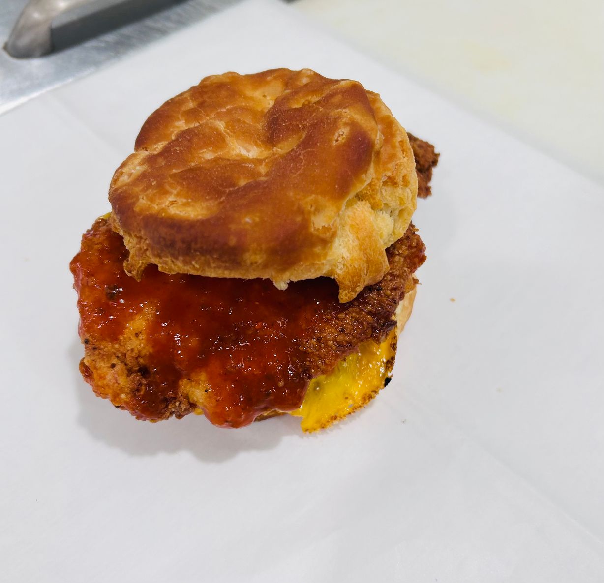 Spicy fried chicken Biscuit at JD SABOR REAL in Woodstock, GA 30188 | YourMenu® Online Ordering