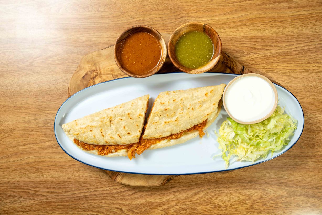 Quesadilla de tinga de Pollo at Sabor Azteca Restaurant in Gaithersburg, MD 20877 | YourMenu® Online Ordering