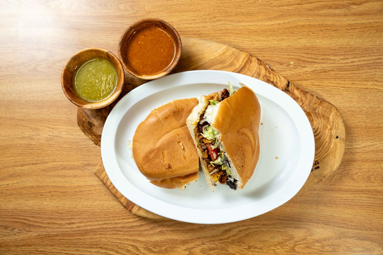 Torta de Barbacoa at Sabor Azteca Restaurant in Gaithersburg, MD 20877 | YourMenu® Online Ordering
