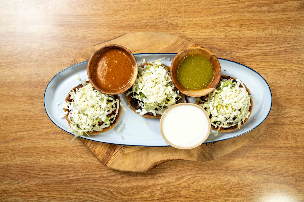 Sope de Tinga de Pollo at Sabor Azteca Restaurant in Gaithersburg, MD 20877 | YourMenu® Online Ordering