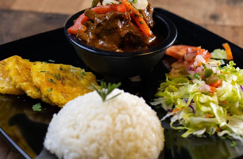 Chivo Guisado at Bohio Latin Flavors in Margate, FL 33063 | YourMenu® Online Ordering