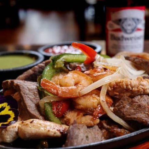 Fajitas De Carne Asada Y Pollo Mix at Chelas Mexican Food & Bar in ROYAL PALM BEACH, FL 33411 | YourMenu® Online Ordering