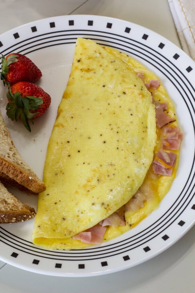  Omelette Ham and Cheese at Atipicos Food in Riviera Beach, FL 33404 | YourMenu® Online Ordering