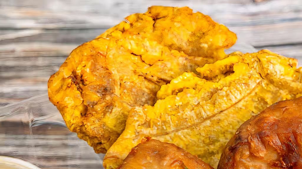 Fried Plantains at PAUL'S UNIQUE GOURMET in MIAMI, FL 33168 | YourMenu® Online Ordering