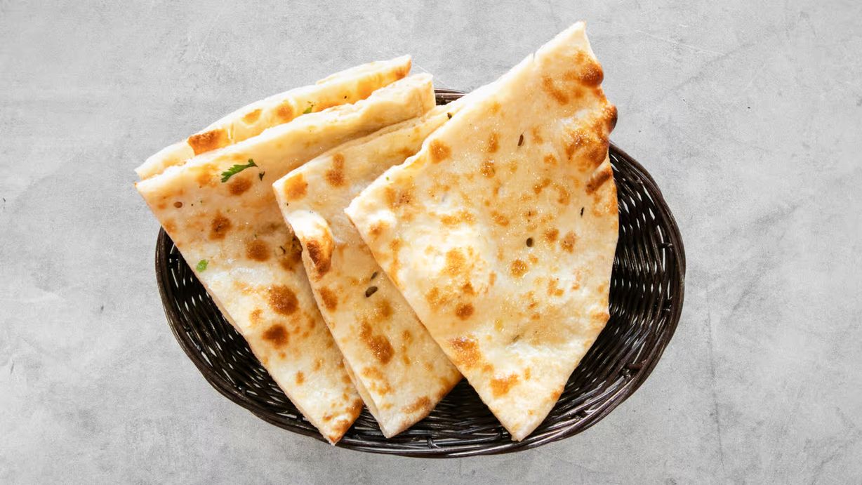 Plain Naan (No Butter) at Saffron Indian Cuisine in Marietta, GA 30066-7617 | YourMenu® Online Ordering