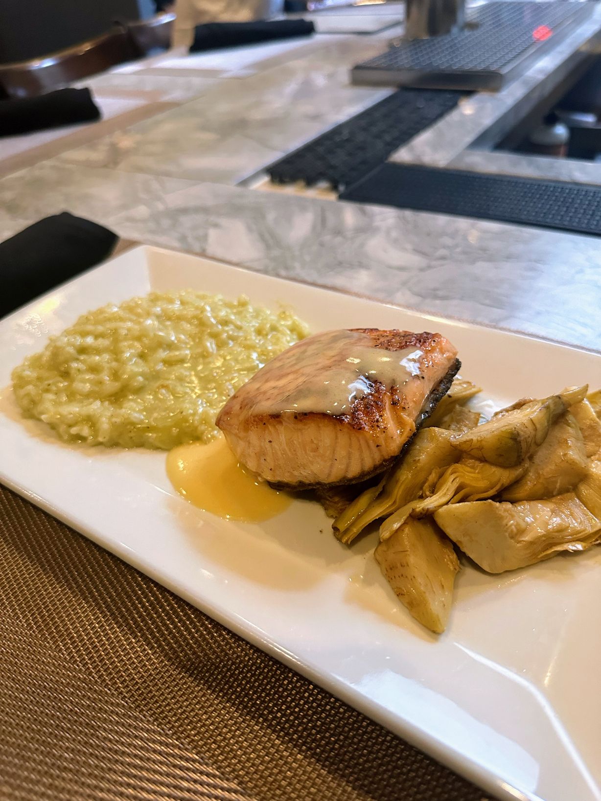 Salmon at Persimmon Restaurant in CHEVY CHASE, MD 20815 | YourMenu® Online Ordering