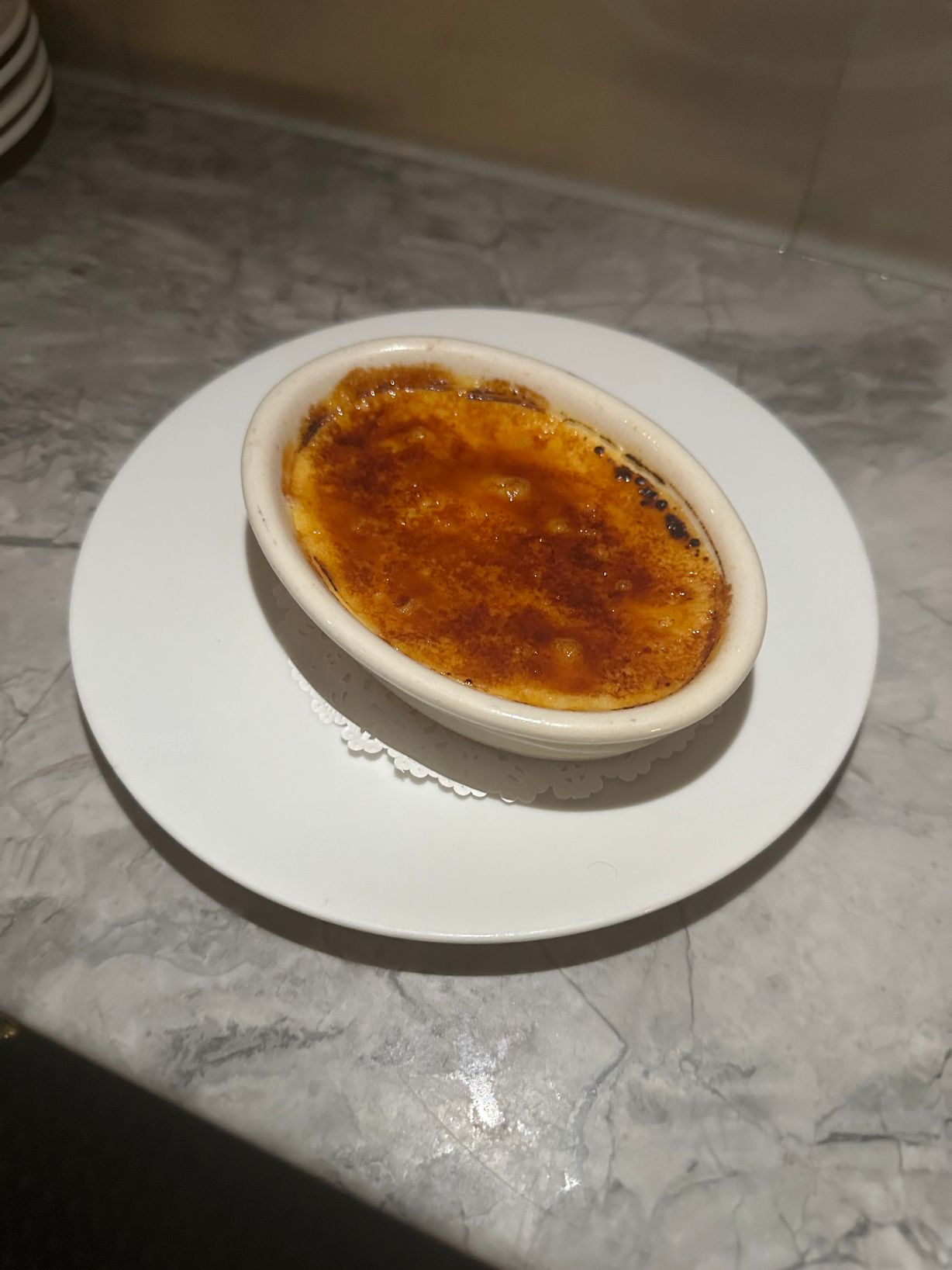 Crème Brulee at Persimmon Restaurant in CHEVY CHASE, MD 20815 | YourMenu® Online Ordering