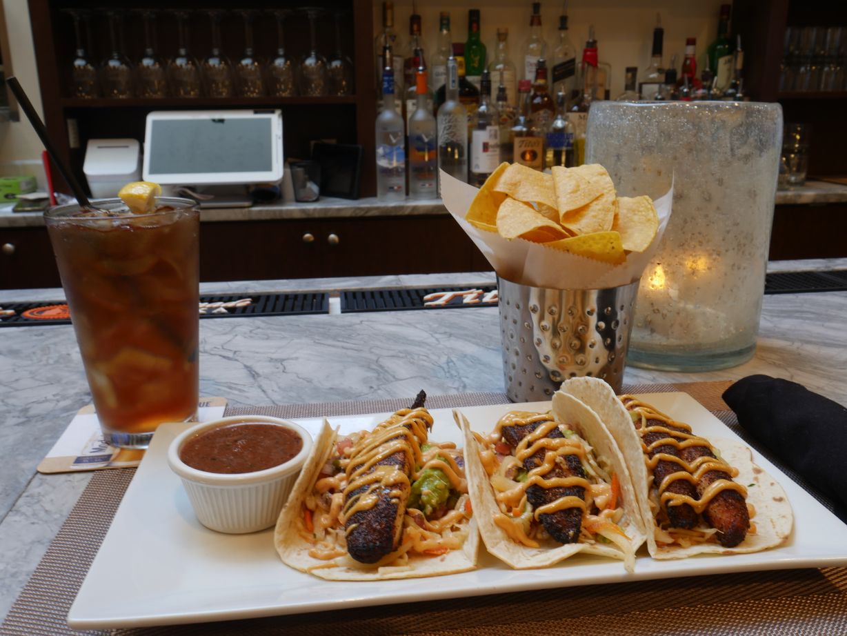 Blackened Fish Tacos at Persimmon Restaurant in CHEVY CHASE, MD 20815 | YourMenu® Online Ordering