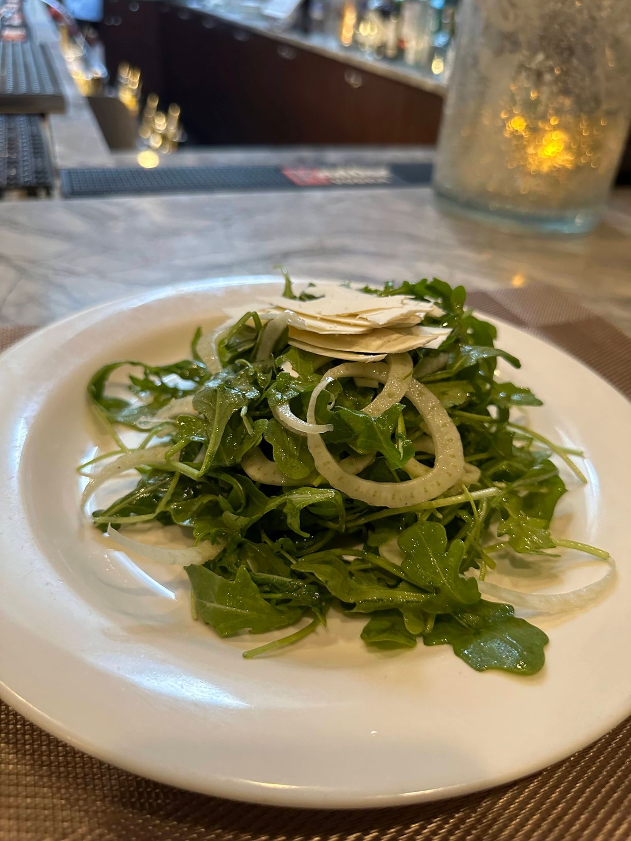 Arugula Salad at Persimmon Restaurant in CHEVY CHASE, MD 20815 | YourMenu® Online Ordering