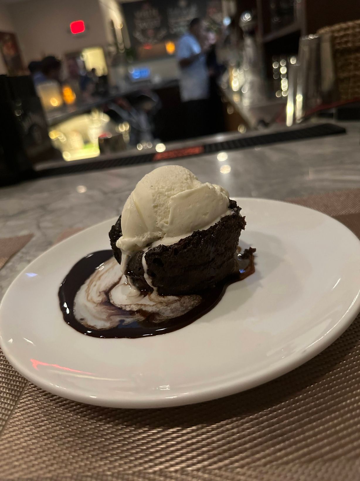 Molten Cake at Persimmon Restaurant in CHEVY CHASE, MD 20815 | YourMenu® Online Ordering