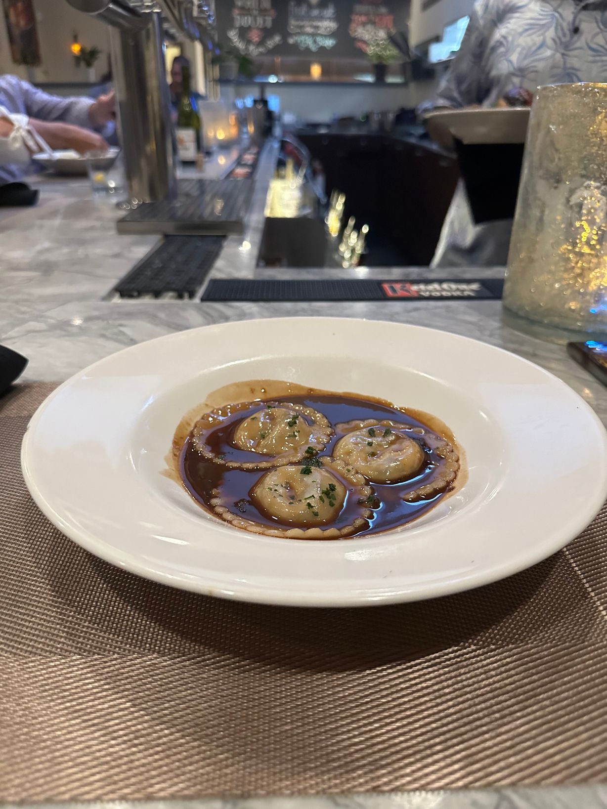 Lunch Ravioli at Persimmon Restaurant in CHEVY CHASE, MD 20815 | YourMenu® Online Ordering