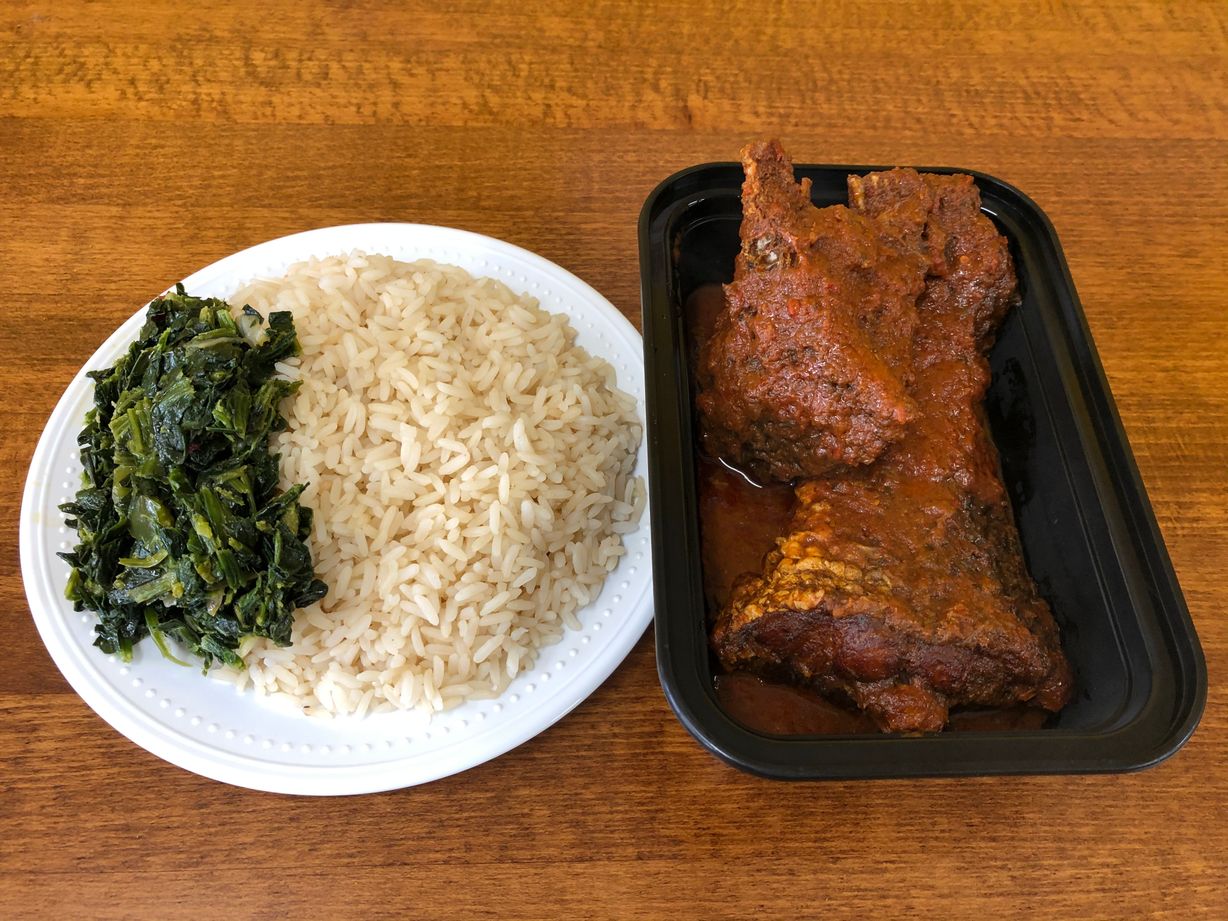 Rice w/ fish stew at Jodeem African Cuisine in Greenbelt, MD 20770 | YourMenu® Online Ordering