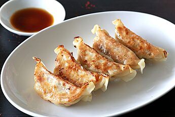 CHICKEN GYOZA (8) at Bou Boxes in Dorado, PR 00646 | YourMenu® Online Ordering