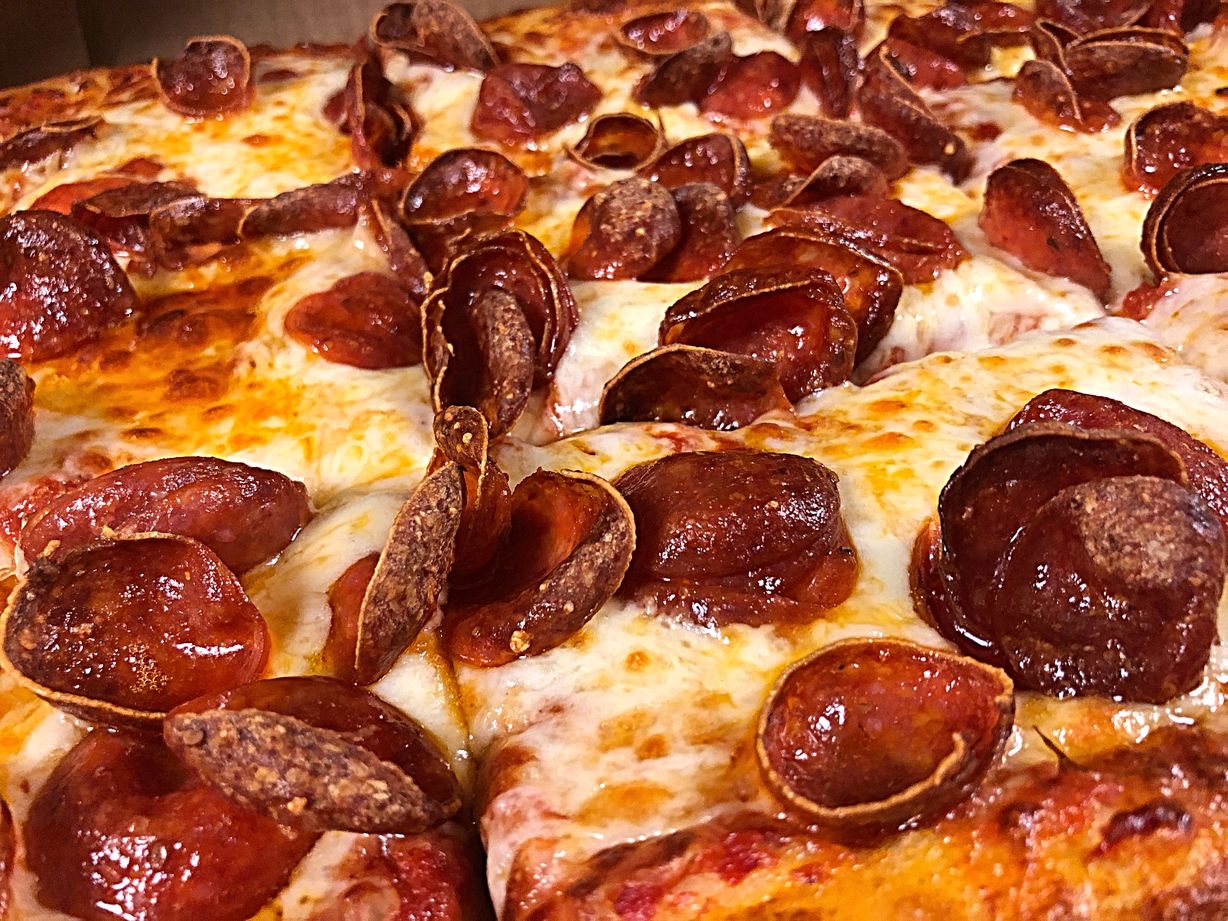 9 Cut Square Large Pizza at HANDLEBAR CAFE in BUTLER, PA 160027724 | YourMenu® Online Ordering