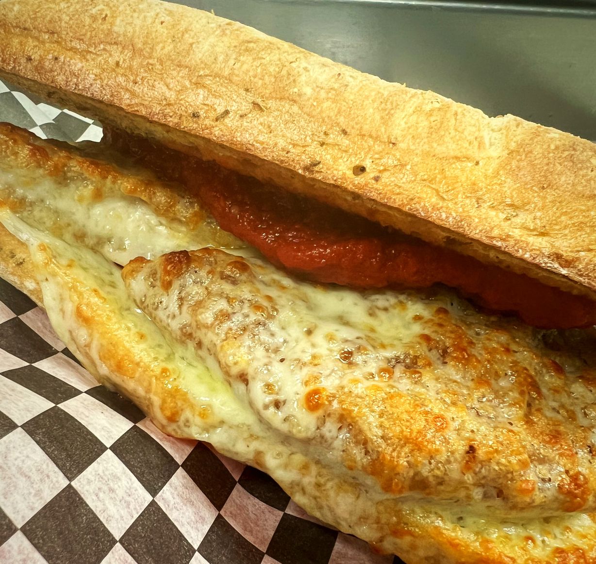Chicken Parmesan Cibatta Sandwich at HANDLEBAR CAFE in BUTLER, PA 160027724 | YourMenu® Online Ordering
