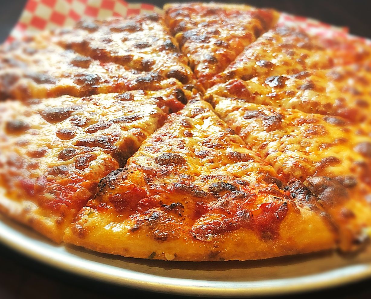 8 Cut Round Medium Pizza at HANDLEBAR CAFE in BUTLER, PA 160027724 | YourMenu® Online Ordering