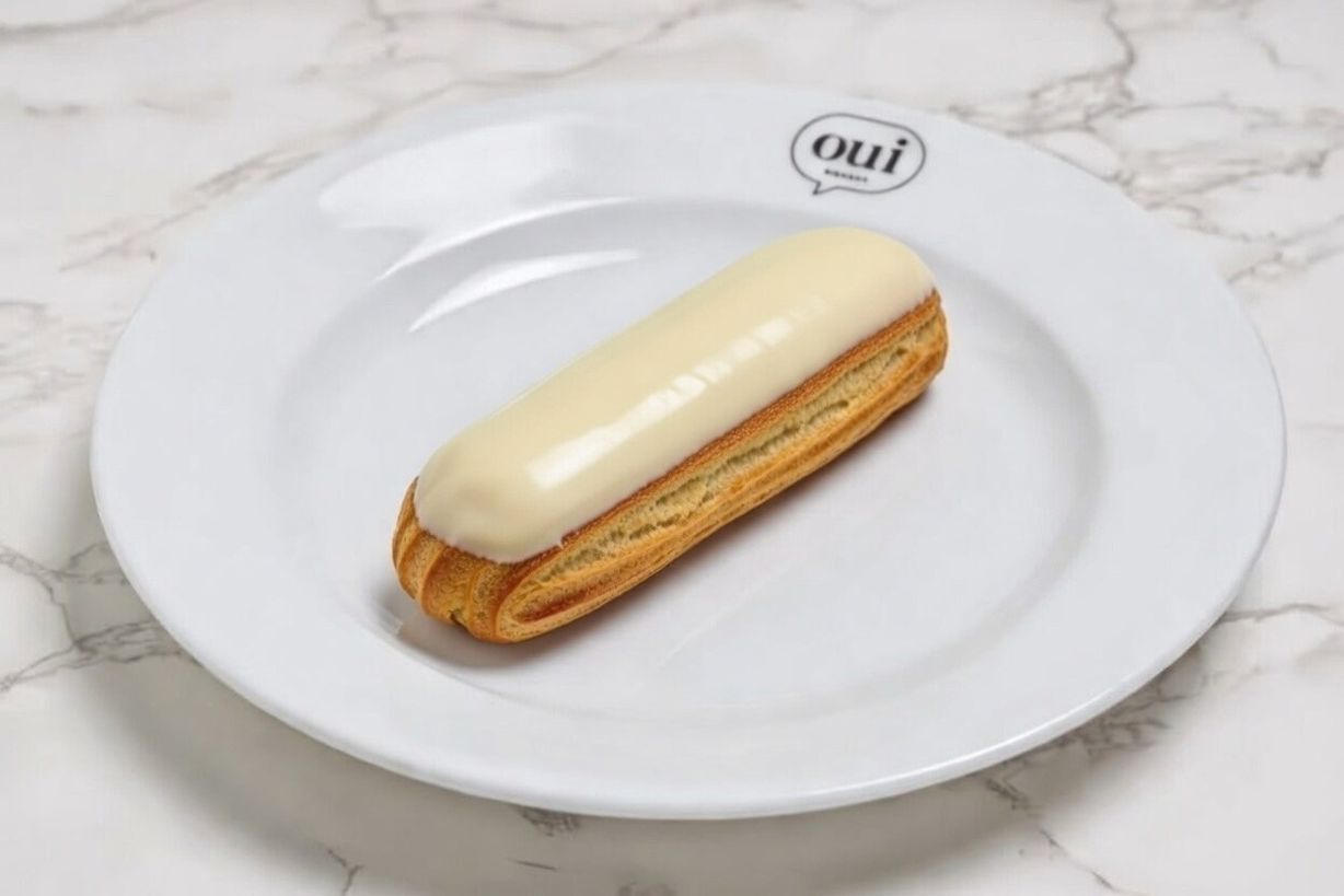 Vanilla Éclair at OUI Bistrot in Miami, FL 33137 | YourMenu® Online Ordering