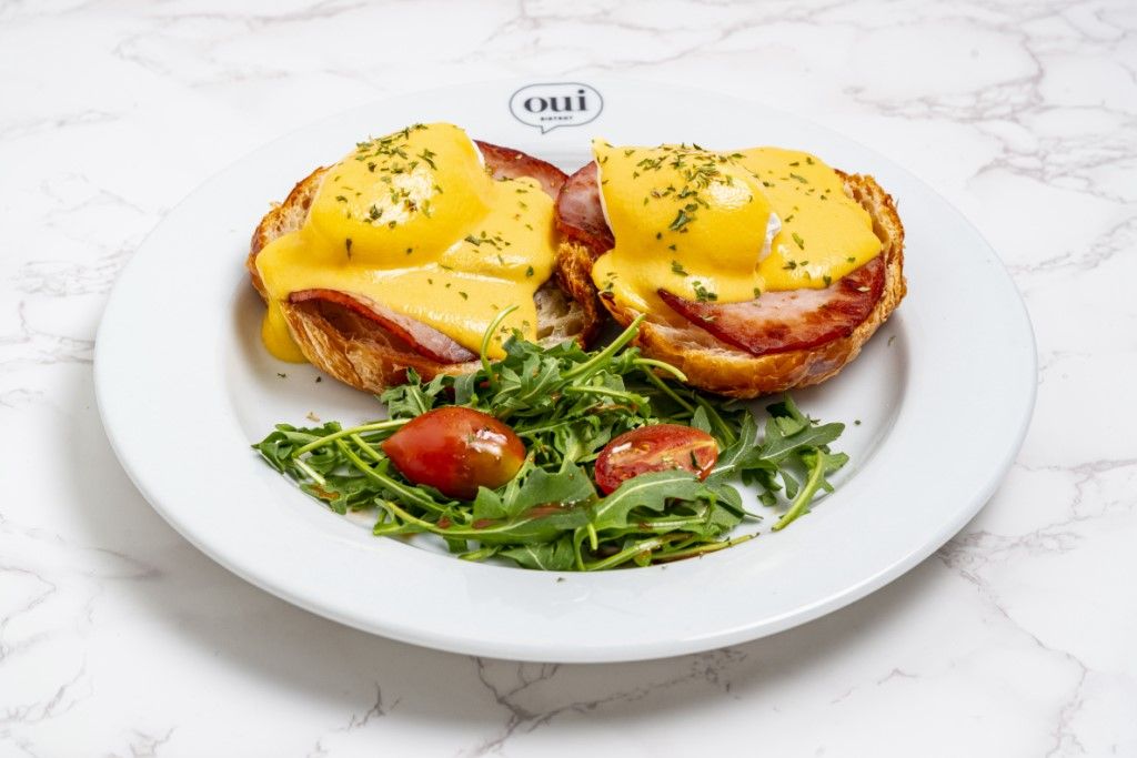 Canadian Bacon  Eggs Benedict at OUI BISTROT in Miami, FL 33137 | YourMenu® Online Ordering