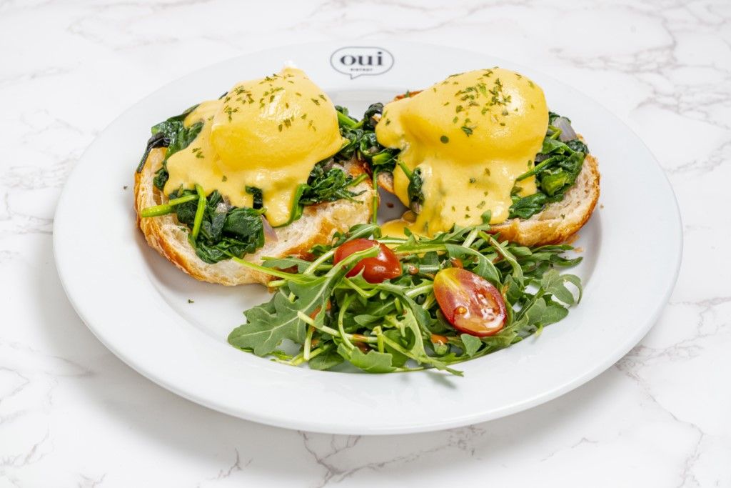 Spinach  Eggs Benedict at OUI BISTROT in Miami, FL 33137 | YourMenu® Online Ordering