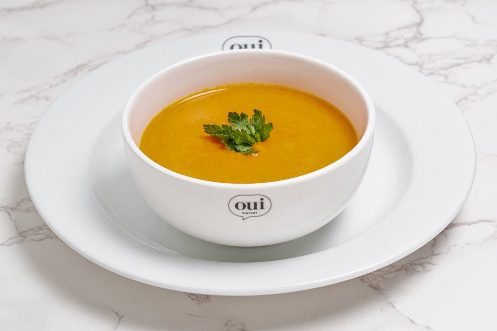Carrot Ginger Soup at OUI Bistrot in Miami, FL 33137 | YourMenu® Online Ordering