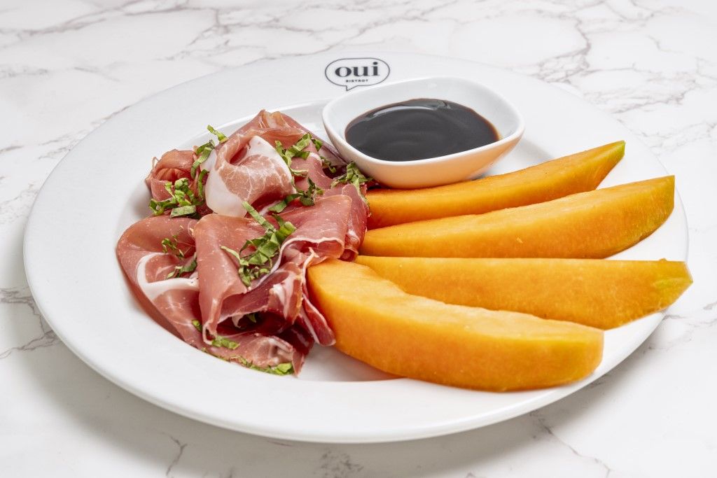 Prosciutto Melon at OUI BISTROT in Miami, FL 33137 | YourMenu® Online Ordering