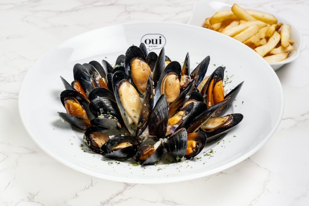 Marinières Mussels (with French Fries) at OUI BISTROT in Miami, FL 33137 | YourMenu® Online Ordering