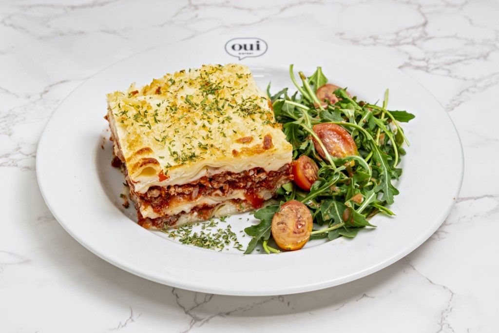Meat Lasagna (with Aragula Salad) at OUI BISTROT in Miami, FL 33137 | YourMenu® Online Ordering