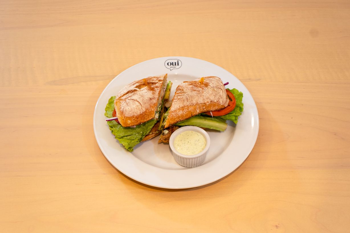 Chicken Avocado Sandwich* at OUI Bistrot in Miami, FL 33137 | YourMenu® Online Ordering