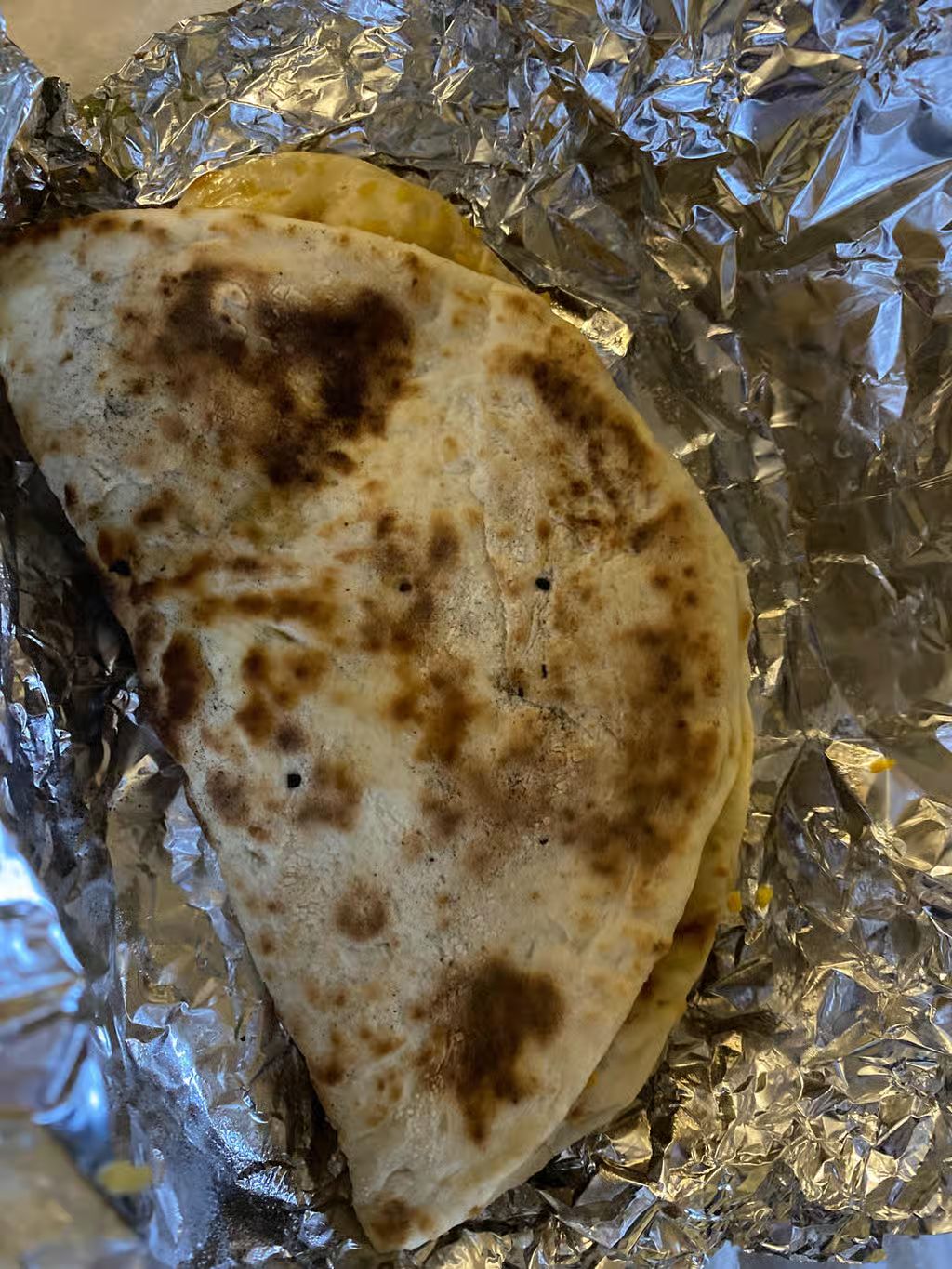 Garlic Naan at Clay Oven Restaurant in Frederick, MD 21702 | YourMenu® Online Ordering