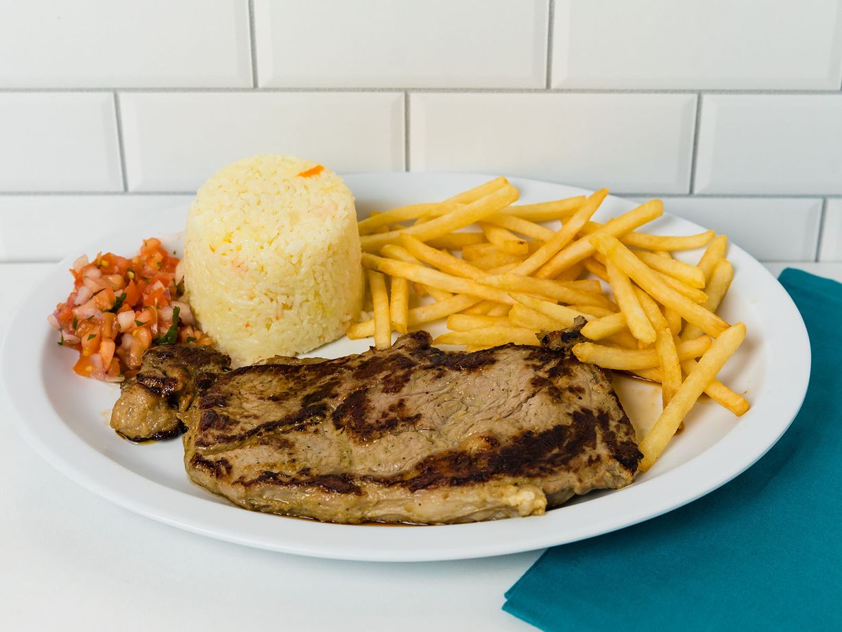 LOMO DE RES A LA PLANCHA at Delicias La Cabaña in HIALEAH, FL 33012 | YourMenu® Online Ordering