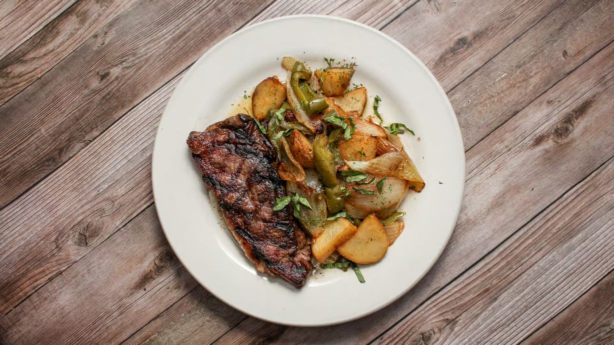NY Strip Peppers, Onions & Potatoes at Aldini's Restaurant in Monroe, CT 06468 | YourMenu® Online Ordering