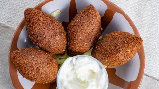 KIBBEH at Raouch Cafe in Falls Church, VA 22042 | YourMenu® Online Ordering
