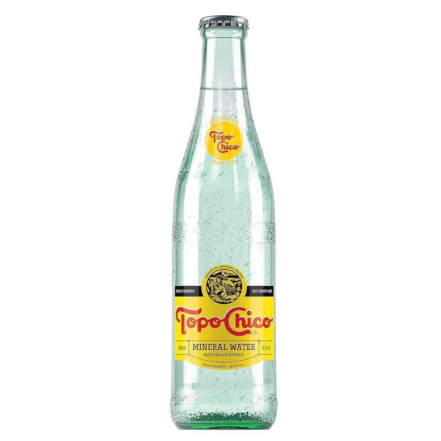 Topo Chico 12 oz at Royal Blue Grocery Quincy in AUSTIN, TX 78701 | YourMenu® Online Ordering