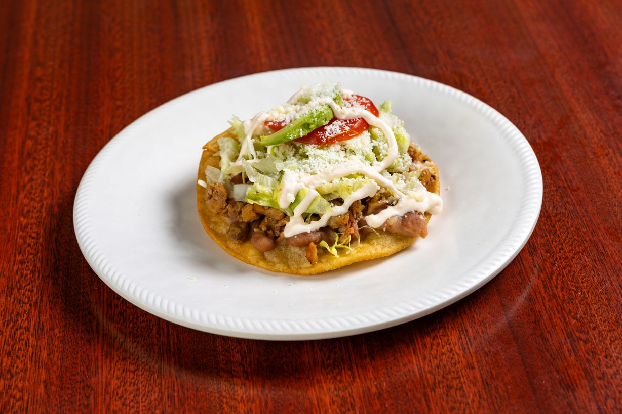 Chorizo / Mex Sausage - Tostada at Taqueria Latina in Pompano Beach, FL 33064 | YourMenu® Online Ordering