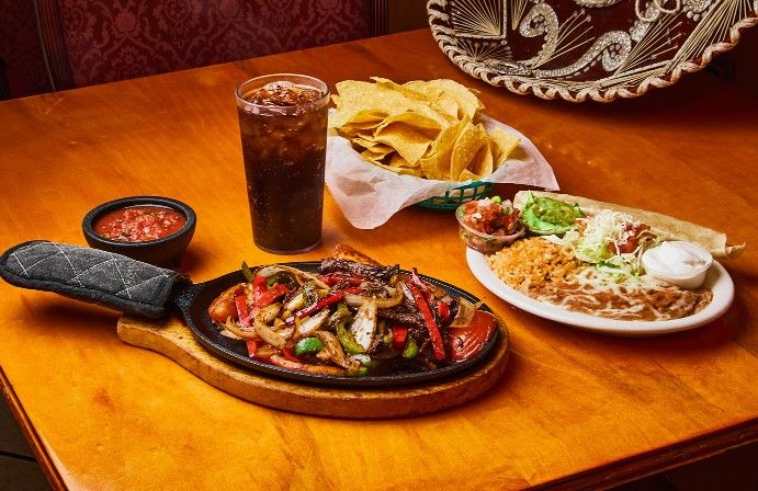 Fajitas (House Specialty) at Ricardo's Mexican Restaurant in Brigham City, UT 84302-2528 | YourMenu® Online Ordering