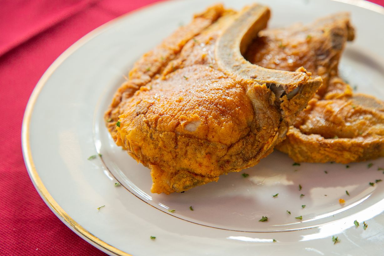 Pork Chop Platter at EllaRay's Cafe in District Heights, MD 20747 | YourMenu® Online Ordering