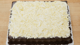 Triple Chocolate Mousse Sheet Cake at Marigold Cafe & Bakery - Cake Menu in Colorado Springs, CO 80919 | YourMenu® Online Ordering