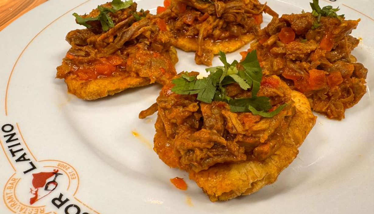 TOSTONES CON CARNE O POLLO DESMECHADO at Sabor Latino Restaurant | Boynton Beach in Boynton Beach, FL 33426 | YourMenu® Online Ordering
