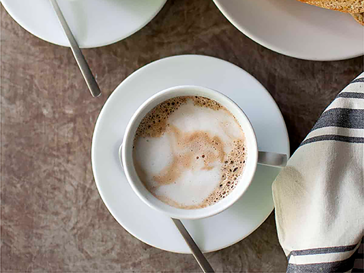 Cafe Con Leche Medium at Oakland Coffee & Juice B in OAKLAND PARK, FL 33334 | YourMenu® Online Ordering