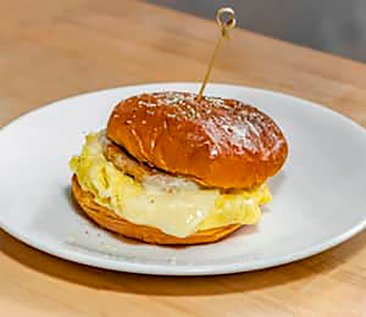 Sausage Egg N Cheese Croissant at Oakland Coffee & Juice B in OAKLAND PARK, FL 33334 | YourMenu® Online Ordering