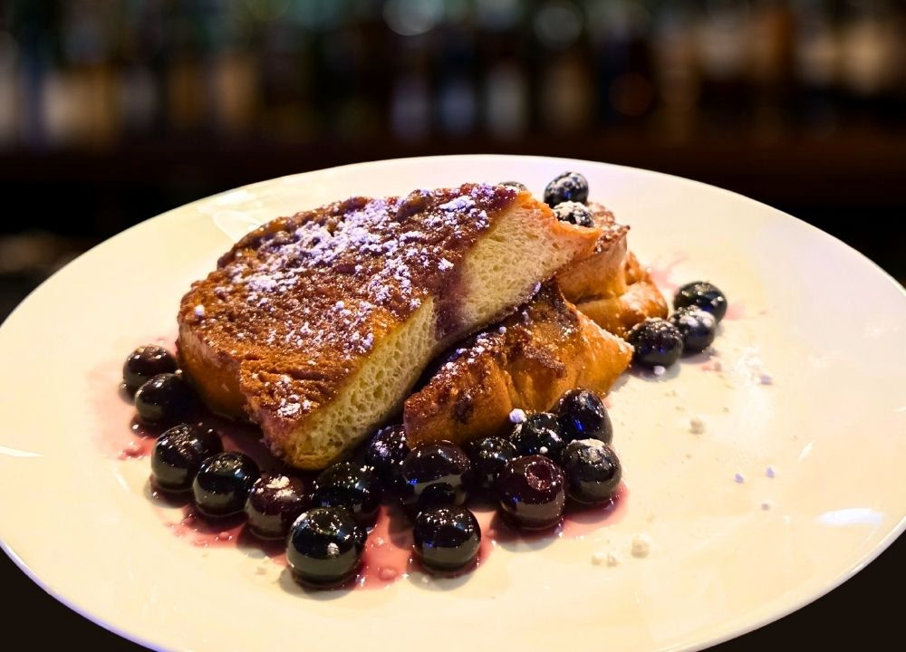 Blueberry French Toast / Tostada francesa de arándanos at Andrew's Restaurant in Suitland, MD 20746 | YourMenu® Online Ordering
