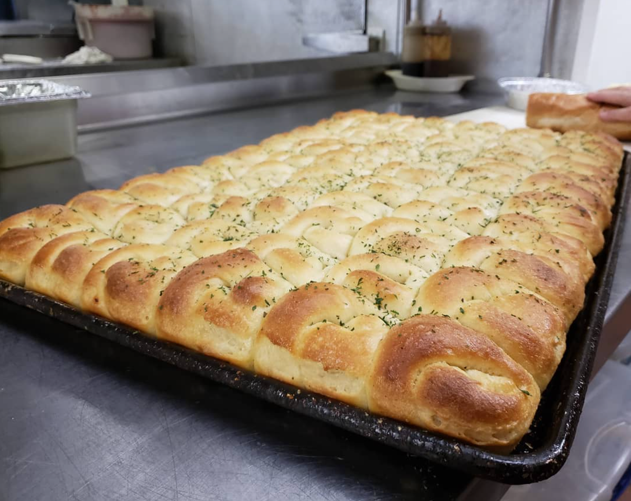 Garlic Bread W/ Spices at Carmine's Pizza Downtown in DALLAS, TX 75201 | YourMenu® Online Ordering