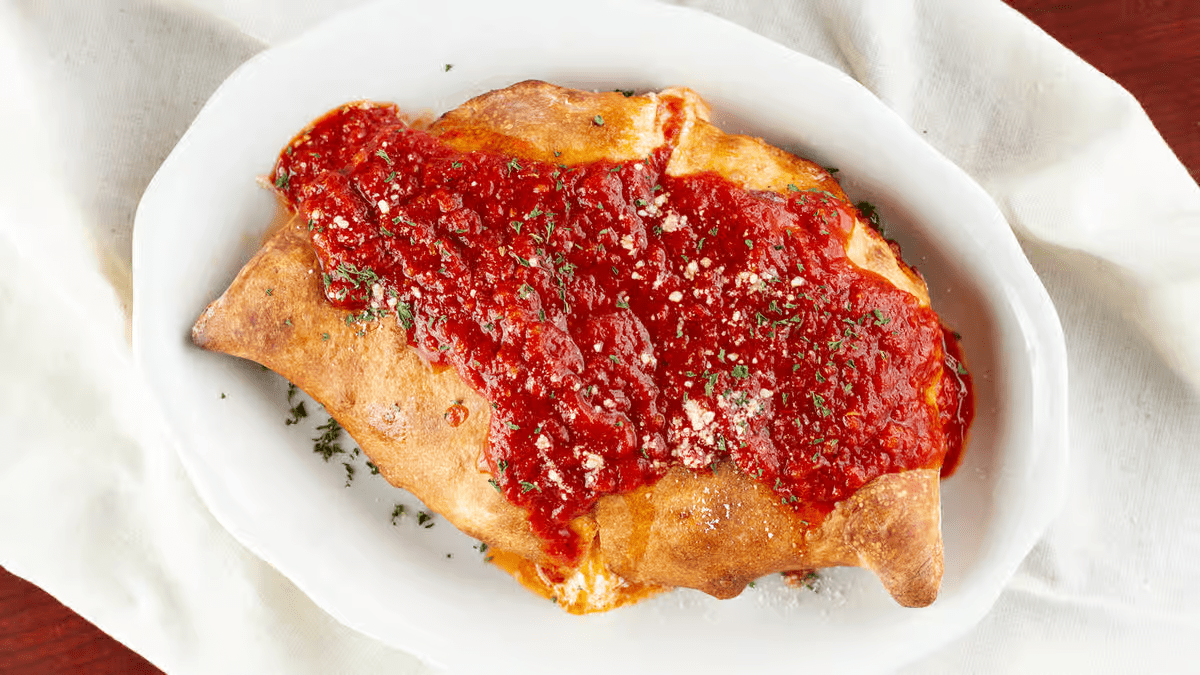 Ham Calzone at Three Brothers Italian - Columbia in Columbia, MD 21045 | YourMenu® Online Ordering