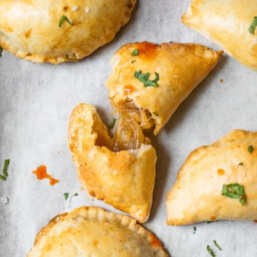Cheese & Onion Empanada at Gratefuel Cafe in Fort Lauderdale, FL 33308 | YourMenu® Online Ordering