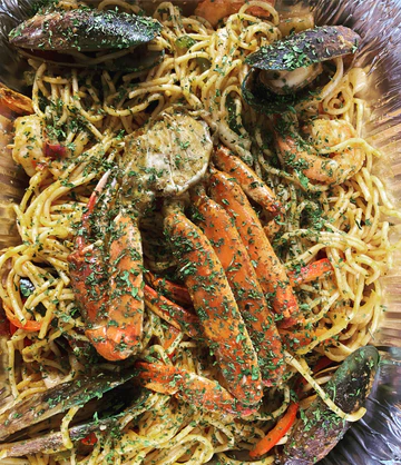 Seafood Spaghetti w/ Crab © at Bon Bagay Restaurant in Miami, FL 33161 | YourMenu® Online Ordering