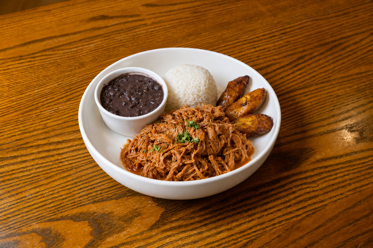Cuban Bowl(shredded Beef, White Rice, Black Beans and Sweet Plantains) at Atipicos Food in Riviera Beach, FL 33404 | YourMenu® Online Ordering