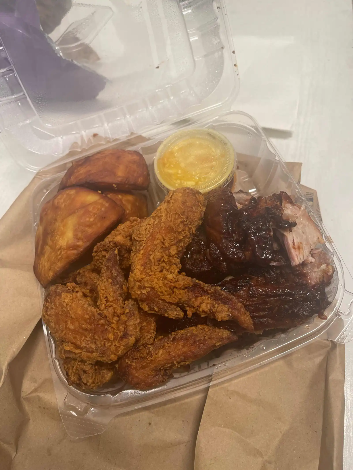 BBQ Ribs Mixed with Fried Chicken at PAUL'S UNIQUE GOURMET WP in West Palm Beach, FL 33409 | YourMenu® Online Ordering
