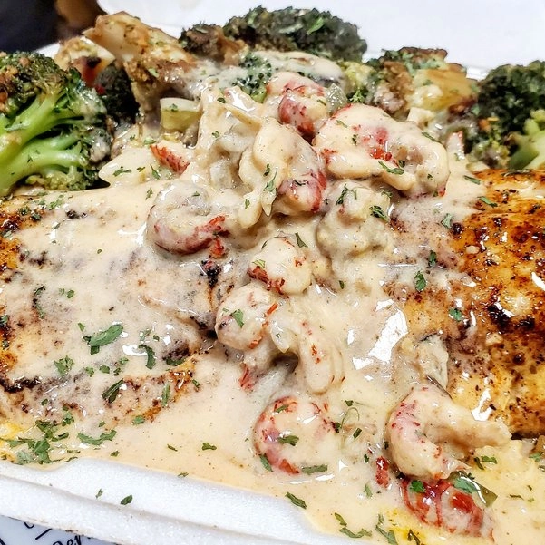 Honey Jerk Shrimp & Salmon Over Hibachi Rice at 1693 Redzone Grill in Jackson, MS 39213 | YourMenu® Online Ordering