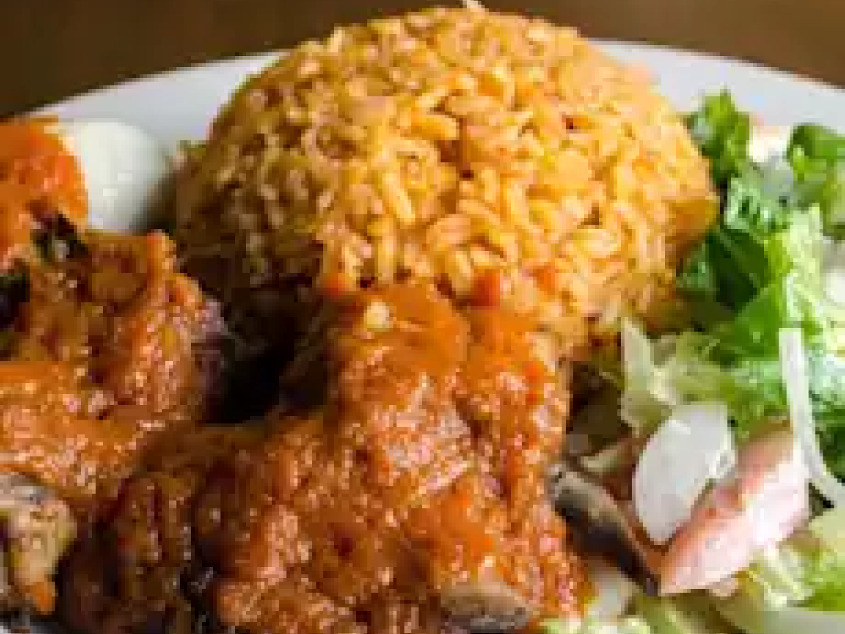 Jollof Rice at Appioo African Bar and Grill in WASHINGTON, DC 20001 | YourMenu® Online Ordering